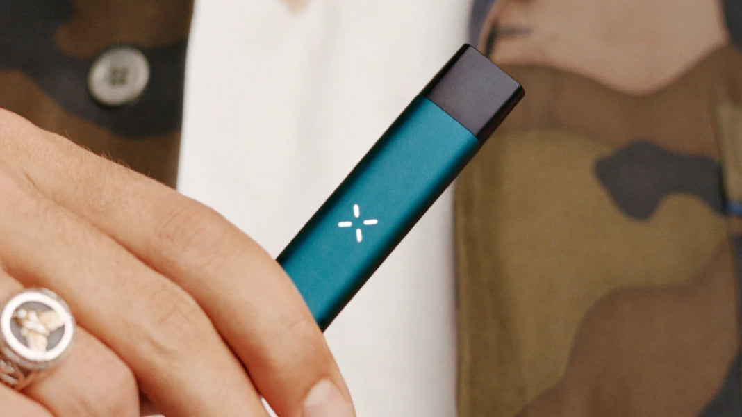 Does vaping cannabis smell? Image of a PAX ERA device in hand