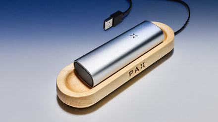 PAX device on a charging tray
