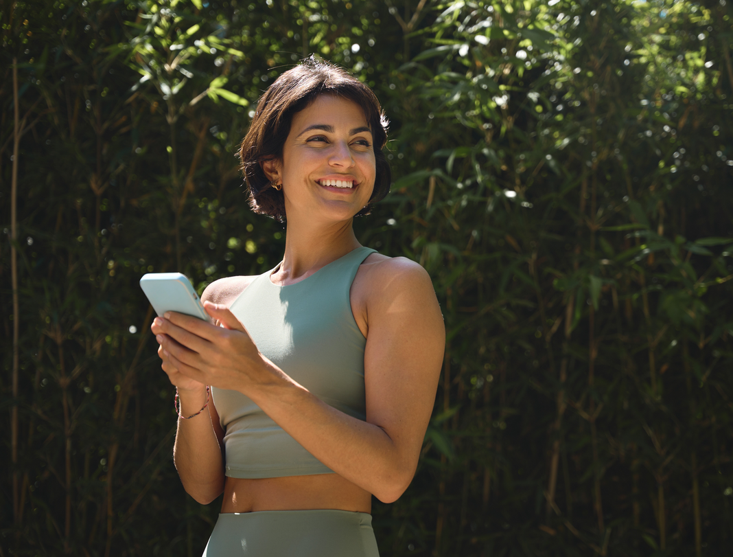 woman enjoying her summer wellness time
